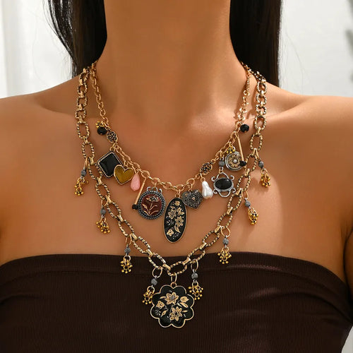The Vintage Empress: Multi-Charm Layered Statement Necklace